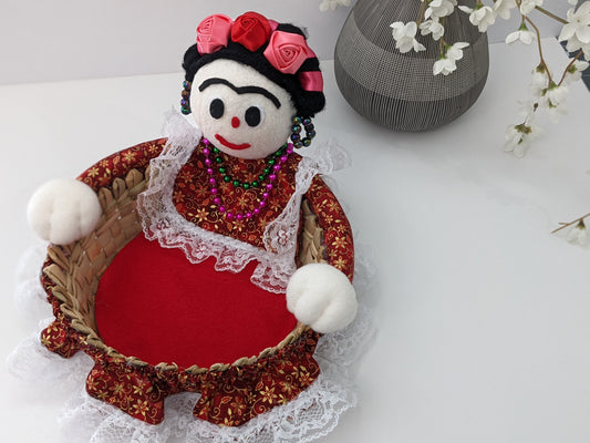 Medium Decorative Basket Frida Kahlo by Luna Marie Designs. She is dressed in red/gold and Kahlo's signature hair Style. Adorned with pink and red roses. Font